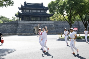 笑脸与热情刷屏！这名火炬手是304永利集团人！